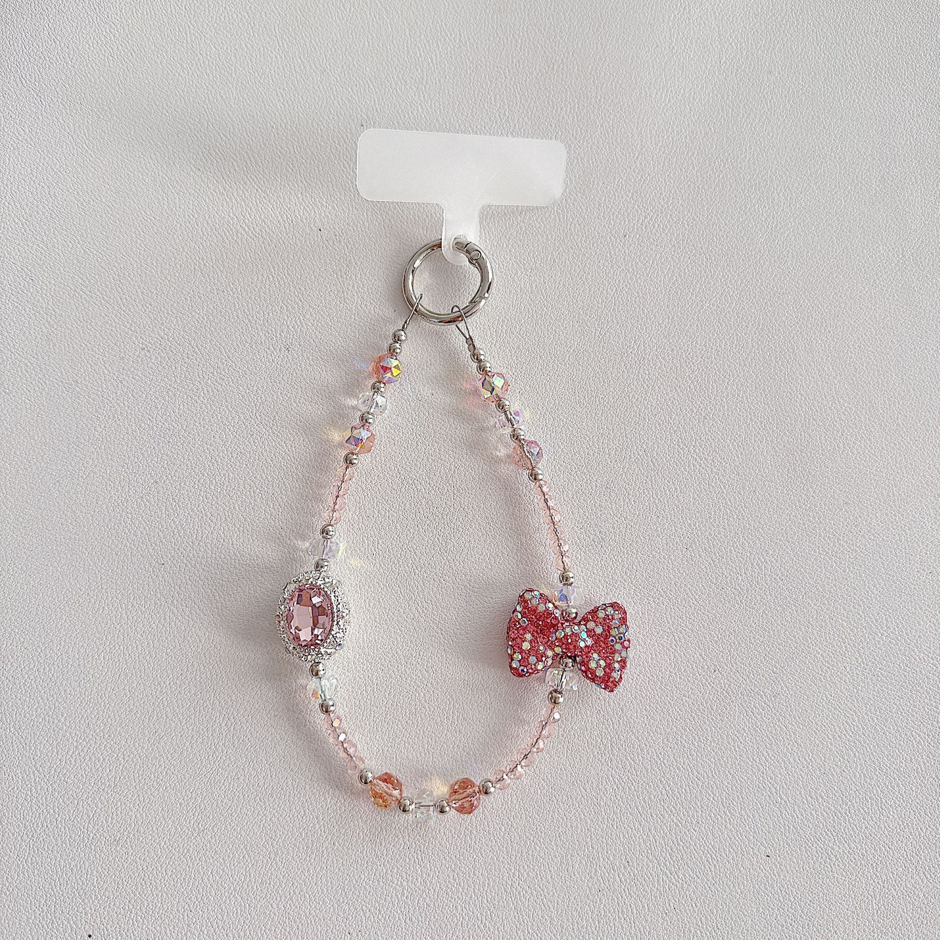 Boutique hecho a mano de alta gama teléfono móvil cadena colgante ins mujer ligero lujo dulce fresco estilo princesa moda teléfono móvil cadena colgante mensajero largo