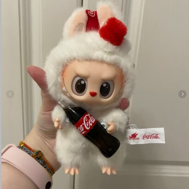 Explosiones de muñecas de llaves de dibujos animados descompresión creativa pellizco juguetes colgantes de estandos de fábrica