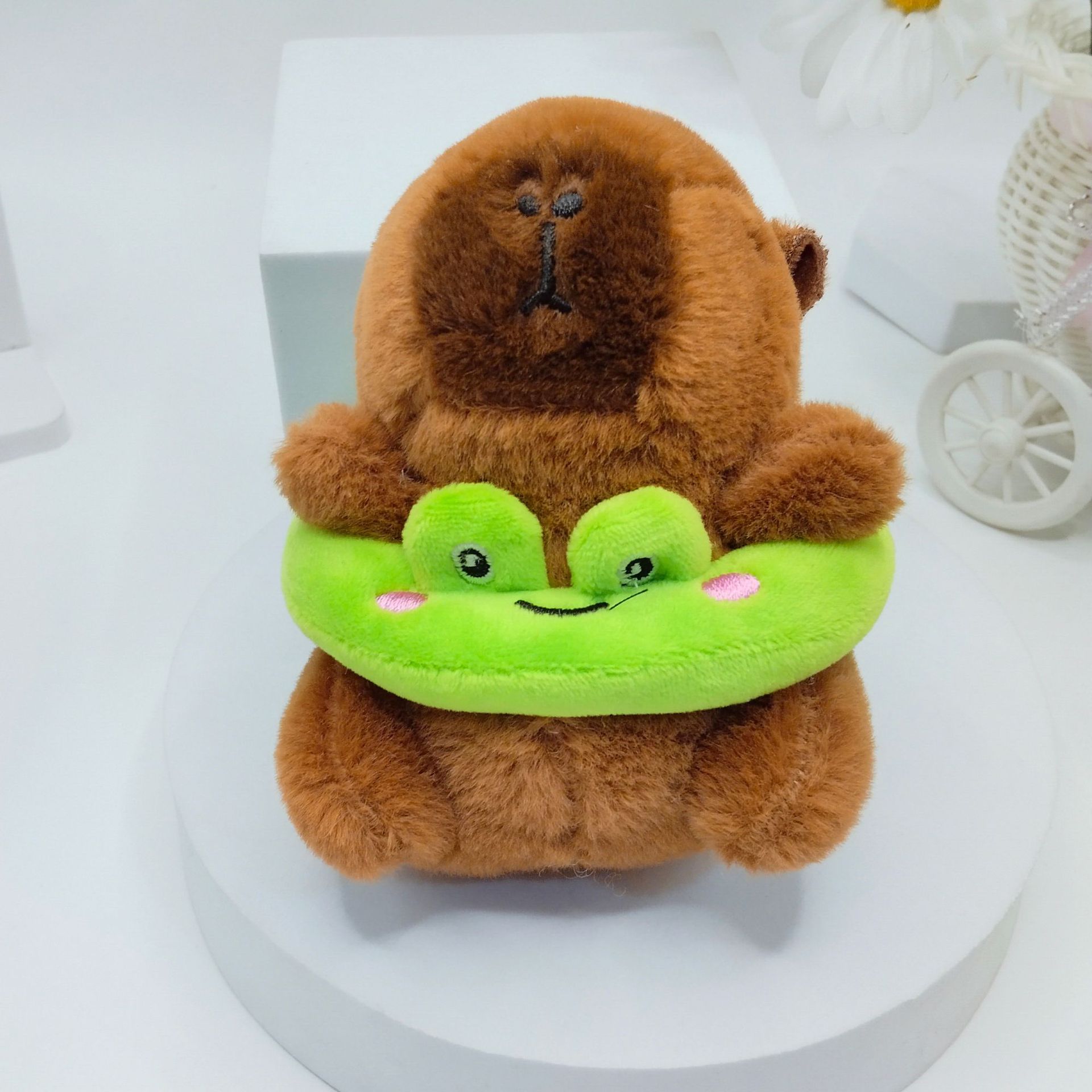 Net red explosions Kapibala swimming ring plush capybara small pendant baby catching machine doll wholesale doll ornaments