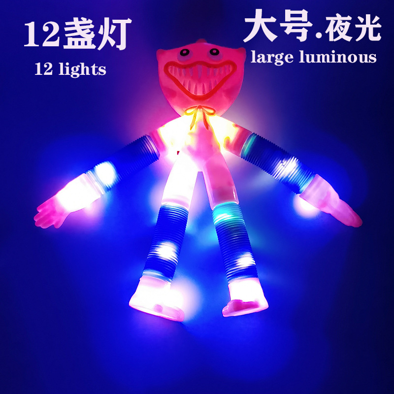 Tubo telescópico luminoso transfronterizo Bobbi muñeca tubo telescópico amapola juego muñeca salchicha monstruo descompresión juguete