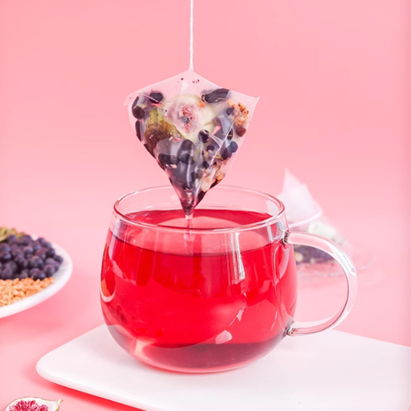 亜麻の種のイチジクの桑の実の茶の黒豆の黒いクコの桑の実の茶の三角の茶は黄体のケトンの種を包んでお茶を循環します|undefined