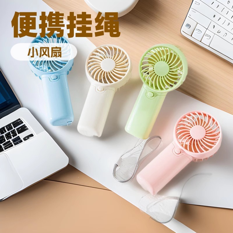 Mini handheld fan, powered by AA batteries, portable USB-powered fan for summer outdoor use, suitable for students and camping, a refreshing little fan