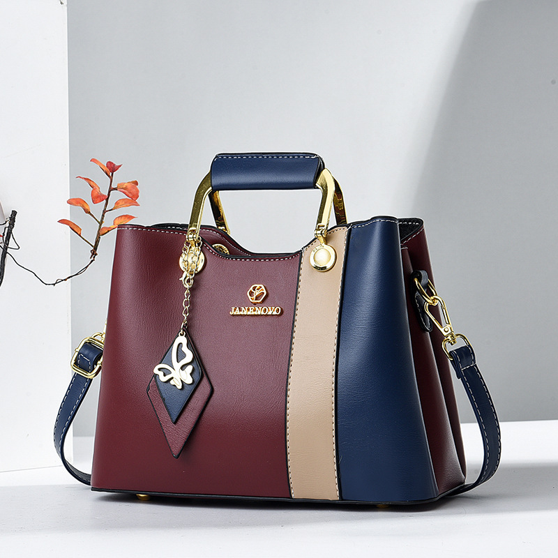 2025 nuevo color contraste bolso de mujer de mediana edad bolso de ropa de cama casual bolso inferior temperamento bolso de madre bolso de hombro portátil