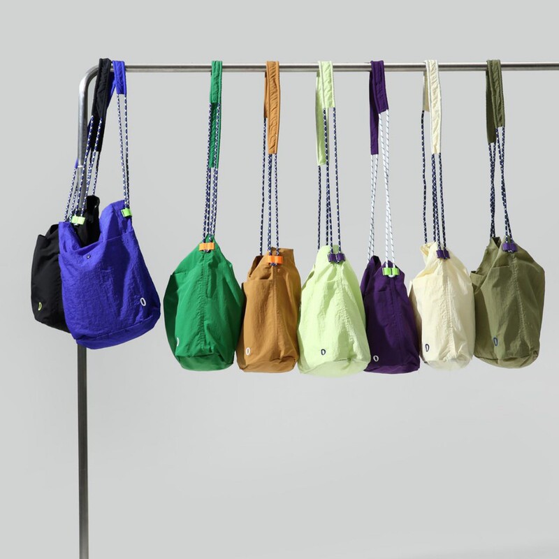 Niche Designer Men's and Women's Couple's Outdoor Function Minimalist Wrinkle Lightweight Sports Water-repellent Crossbody Shoulder Bag