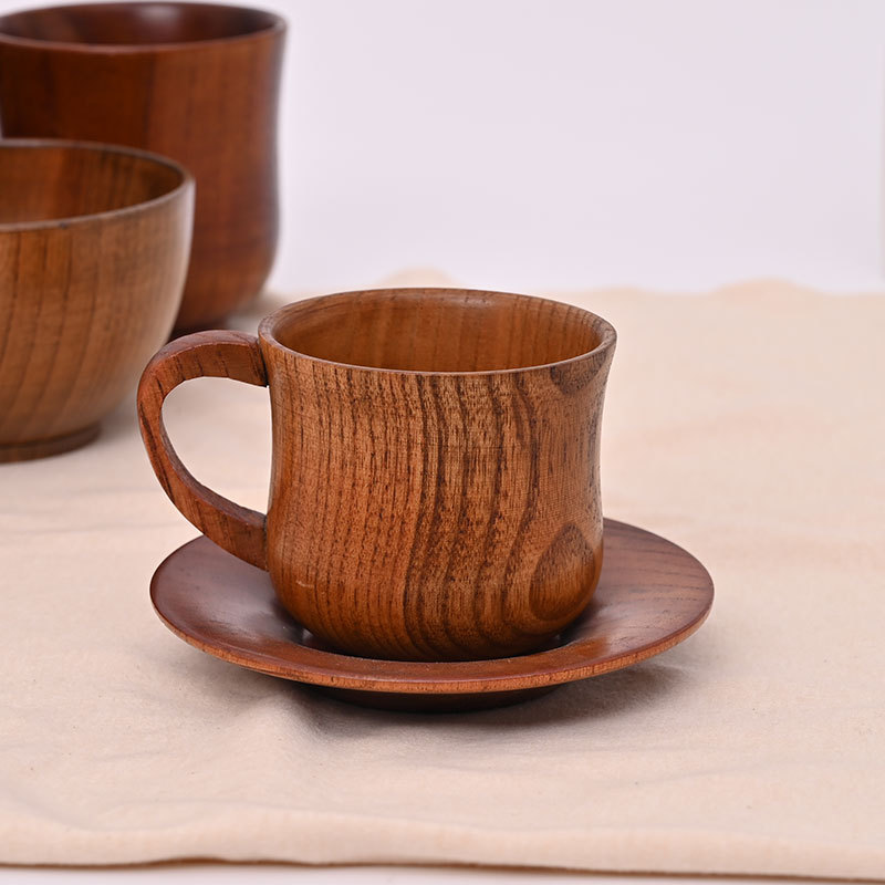 Suministro directo de fábrica Taza de café creativa de madera Taza retro de madera maciza Taza de mango antiescaldado Gran cantidad