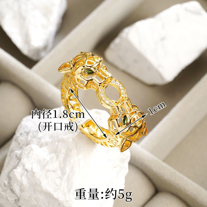 Nuevos productos de oro de arena galvanizado 18k pulsera de fijación ligera de lujo ojos verdes cabeza de leopardo hueco anillo de alquiler no se pierde joyería