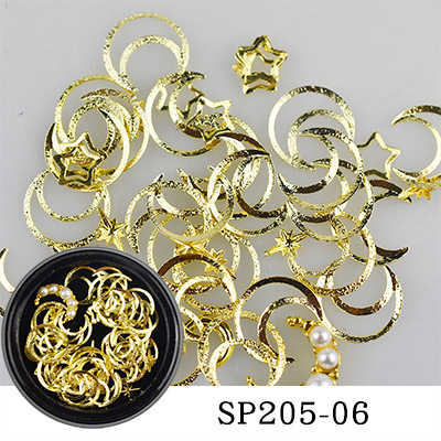 Nuevas joyas de manicura transfronterizas joyas de la luna de estrellas mezcladas caja de metal conjunto de cobre popular remaches accesorios de manicura