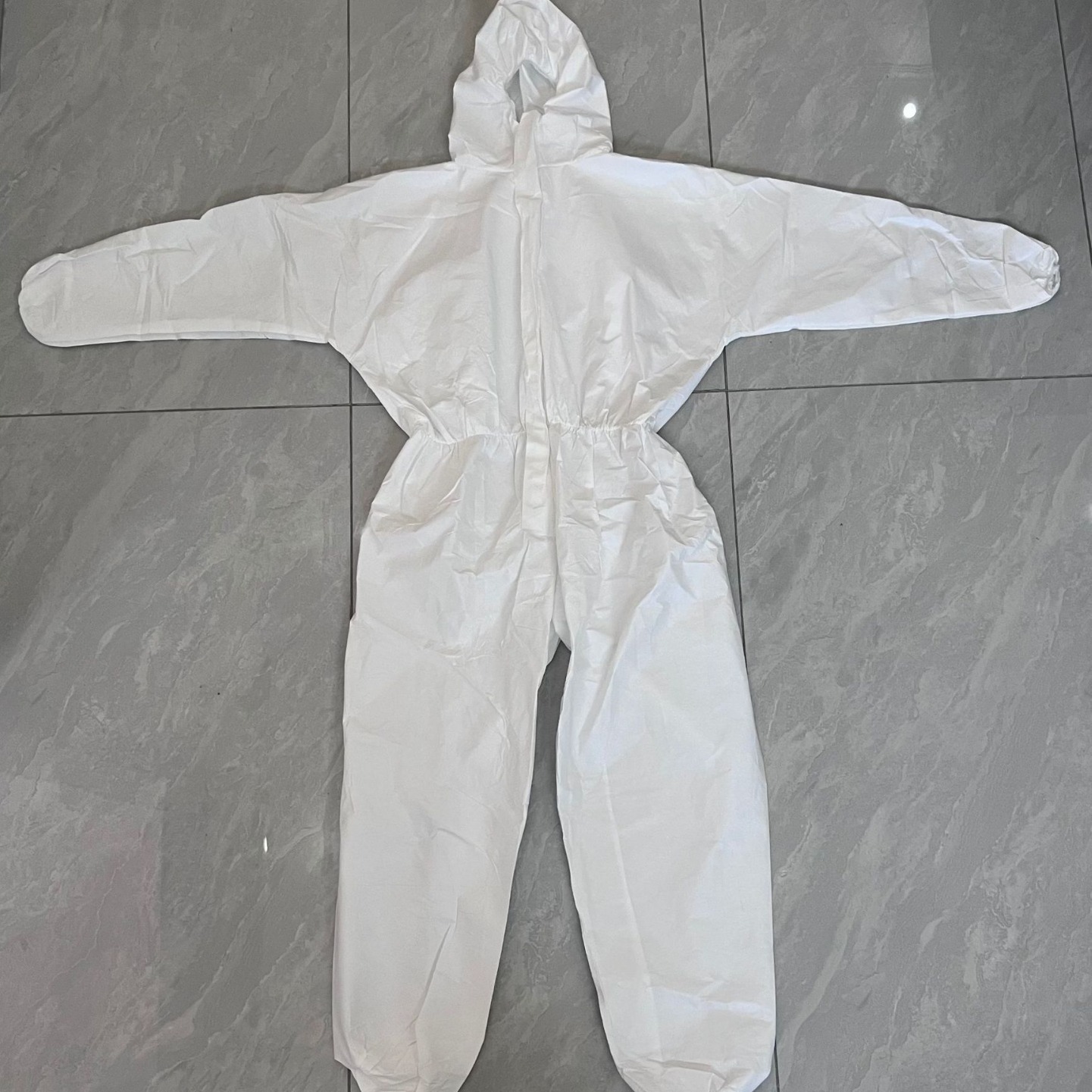 Large quantity discount spot can send large white disposable non-woven fabric + pe composite breathable membrane protective clothing