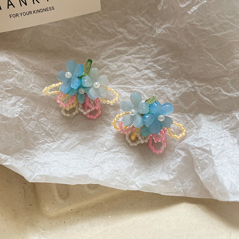 Pendientes de flores de color dopamina de verano Pendientes de todo fósforo de nicho fresco Pendientes de lujo de alta gama de moda al por mayor