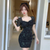 Short sleeved printed slim fit skirt with French square neckline pleated waist design and a wrap around hip skirt