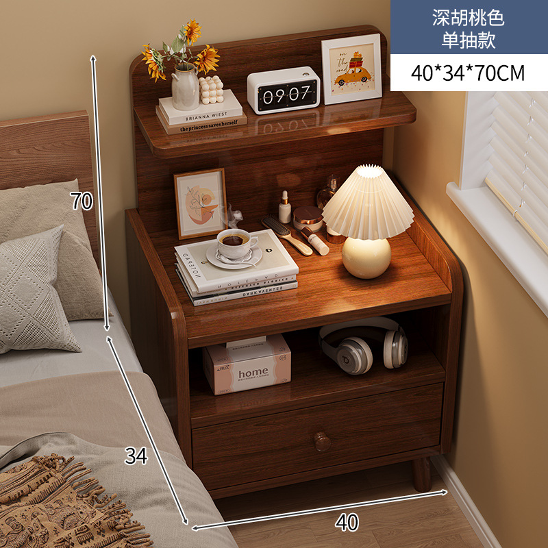 Mesilla de noche simple y moderno armario de almacenamiento de pierna de madera maciza pequeño dormitorio simple hogar 2025 nuevo estante de cabecera