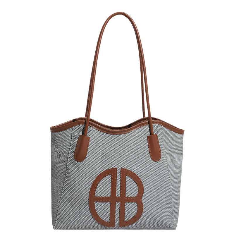 Bolsa de brazo de gran capacidad para viajar 2026 nueva moda bolso de mujer de alto nivel nicho bolso de hombro bolso especial para mujeres