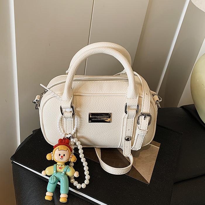 Bolso de bolera de mano de estilo explosivo para mujer 2025 nuevo bolso de hombro de estilo occidental de todo fósforo bolso de mensajero de paso de moda de alta gama