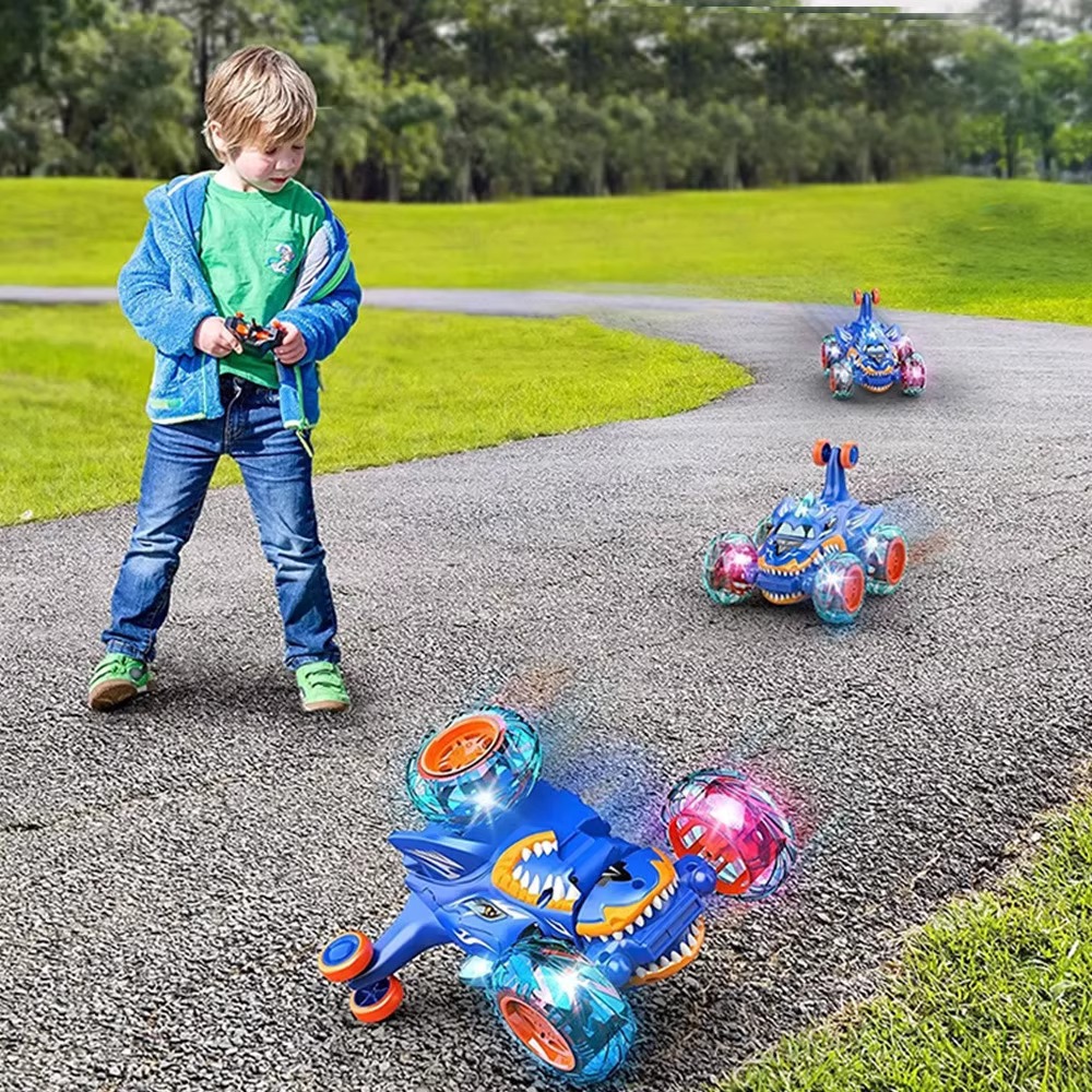 Transfronterizos vehículos de acrobacias de control remoto 360 grados giratorios vehículos de control remoto tk 2.4G tiburones carreras luces camión volcado