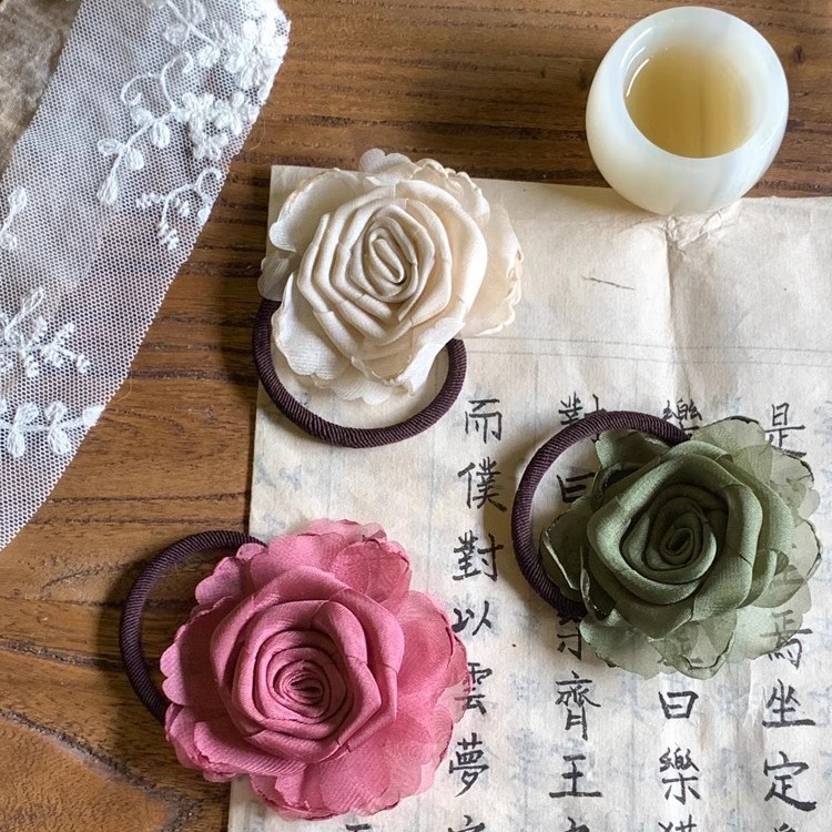 Nueva onda verde china 2024 nuevo estilo nacional rosa correa de cabello de correa de cabello de mujer atada flor de cabeza de alta calidad