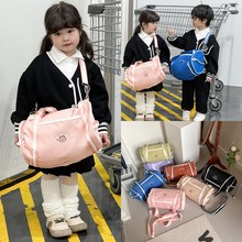 儿童包包韩版时尚ins网红男童女孩手拎斜挎水桶枕头包纯色简约包