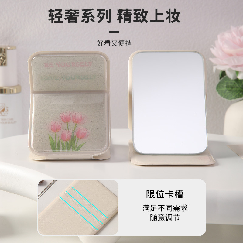 Inswind encantador de alto valor facial espejo de maquillaje espejo plegable pequeño espejo portátil de vestir espejo de estudiantes