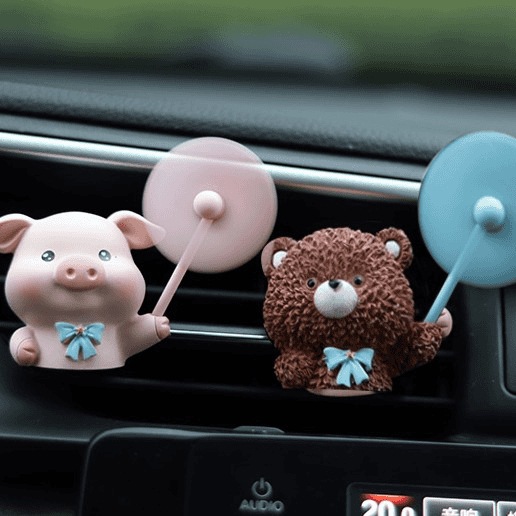 Aire acondicionado del automóvil salidas de aire decoraciones aromáticas dibujos animados lindo cerdo coche eléctrico consola adornos de perfume montados en el automóvil