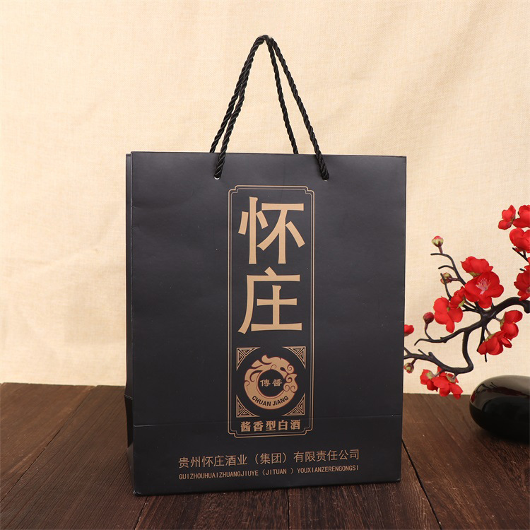 厂家供应商场购物礼品袋 彩印广告折叠白卡纸袋 通用服装手提袋