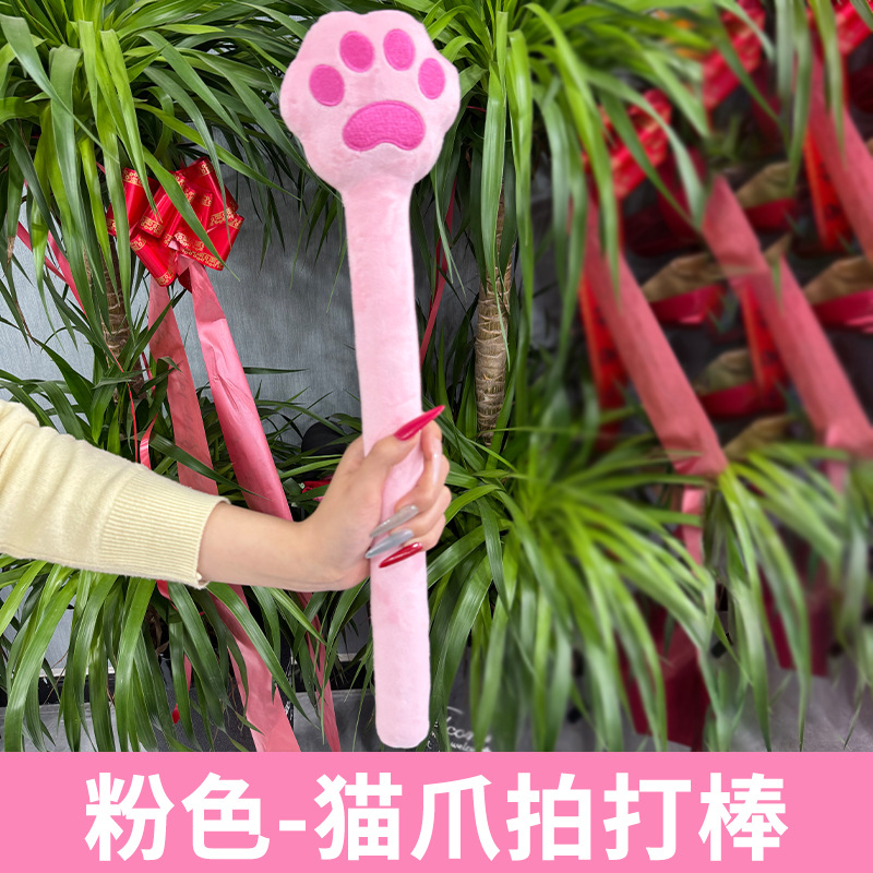 Mugwort Meridian Tapping Hammer Massage Stick with Memory Foam and Velvet for Body Wellness in use