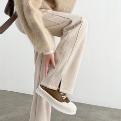人の字の紋様のベルベットの広脚のズボンの女性の春と秋冬の狭い版のまっすぐな筒の開いたフォークの毛のズボンの厚い模造のウールのニットのズボン