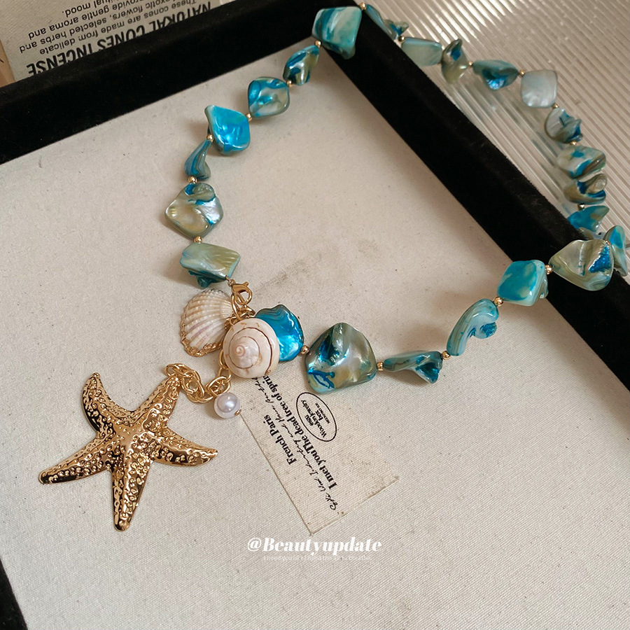 Concha Concha Concha Estrella de mar Juego de collar de perlas Estilo de vacaciones junto al mar Temperamento Cadena de clavícula Moda Collar de todo fósforo al por mayor