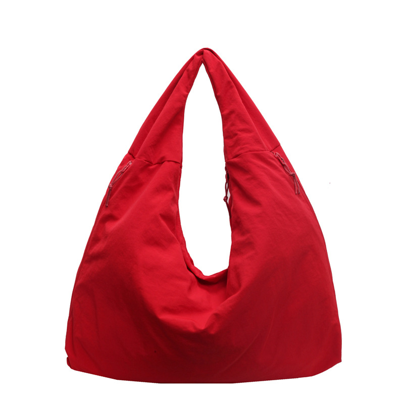 クロスボーダー大容量人気の気質脇の下バッグ 2025 新しいファッションナイロン布ショルダーバッグレトロハンドヘルドレディースバッグ