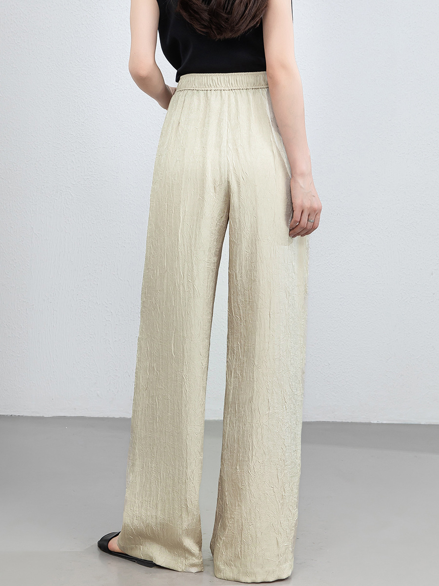 Quần culottes nữ ống rộng chất liệu mềm mại, cạp chun, dáng suông rủ nhẹ — màu trắng ngà