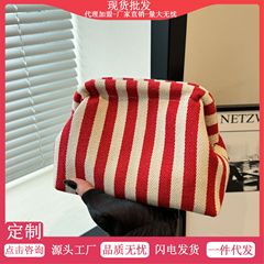 レディースバッグ新しいクロスボーダーストライプレディースクラッチバッグ縦ストライプコントラストカラーシェルバッグファッショントレンドニッチクラウドバッグ