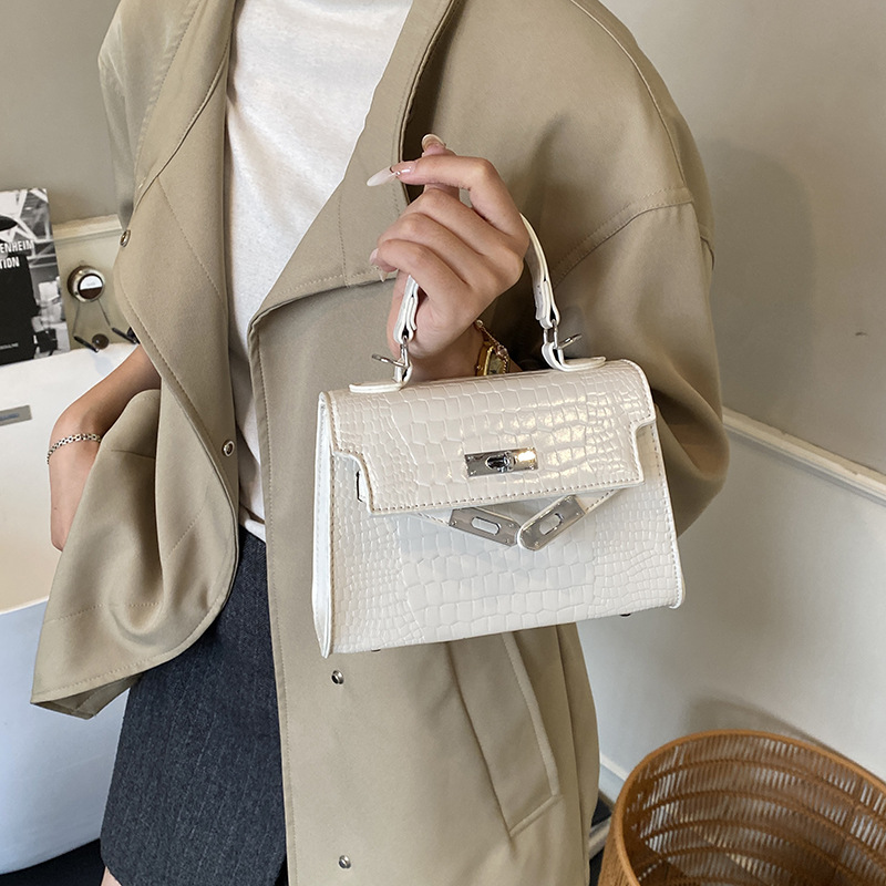 Bolsos de piedra de alta calidad para mujeres 2025, nuevos bolsos de moda portátiles de invierno versátiles mochila de viaje
