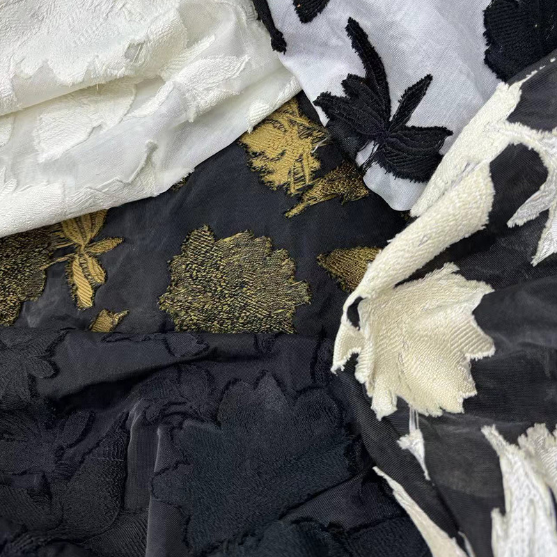 新款春夏款剪花流苏服装面料连衣裙女装布料外贸出口欧美布装饰布