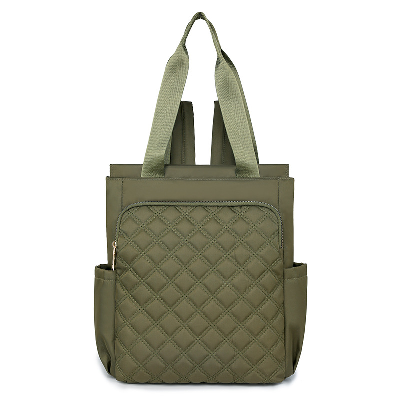 Mochila de mujer salvaje de color puro 2024 nueva mochila portátil de moda, bolso de viaje ligero y de gran capacidad