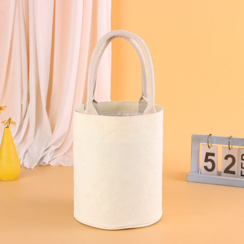 圆筒包简约单色牛津布手拎包日常通勤加厚有底手提袋收纳袋购物袋