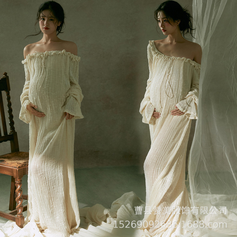Stunning maternity photoshoot: ethereal, flowing long dress with a one-shoulder design and floral embellishments, perfect for capturing beautiful images of pregnant women, even at home Stunning maternity photoshoot: ethereal, flowing long dress with a one-shoulder design and floral embellishments, perfect for capturing beautiful images of pregnant women, even at home