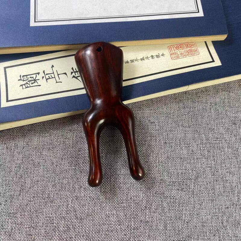 サイの角の紫檀木の鼻はマッサージ器の顔のツボの経絡を剃ります。|undefined