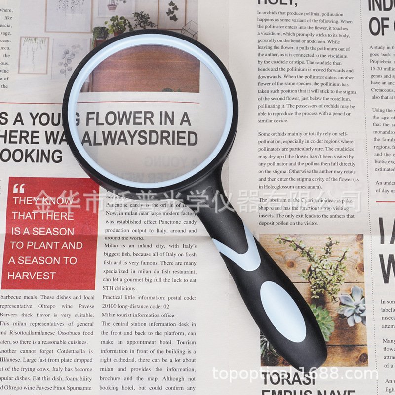 Two-color glass handheld magnifying glass