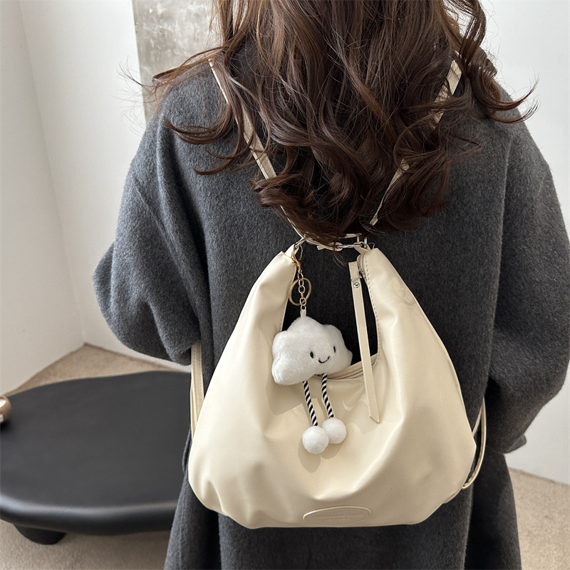 Mochila de moda coreana de invierno para mujeres 2024 nueva mochila de hombro simple de gran capacidad para mujeres