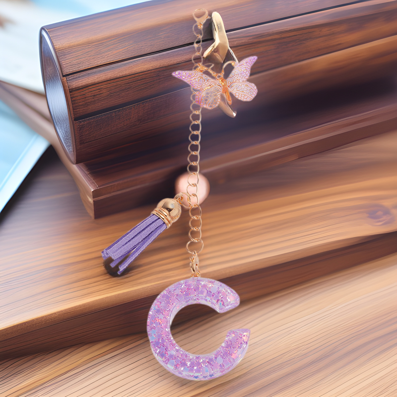 Cross-border Amazon Hot Sale English Letter Resin Key Purple Butterfly Tassel Pendant Women's Bag Pendant