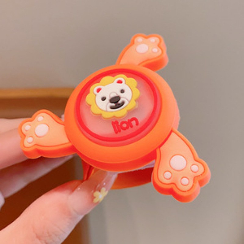 Rotating bracelet orange lion