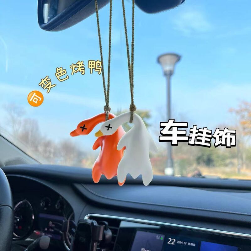 光と紫外線にさらされると色が変わる新しい色が変わるローストダックペンダント、車用ペンダント、ローストダックキーホルダー、ブラックテクノロジークリエイティブ|undefined