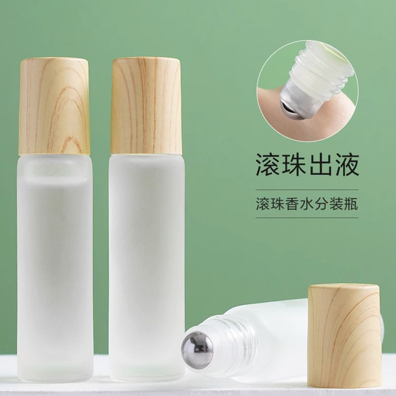 Cubierta de grano de madera botella de rodillo botella de aceite esencial de vidrio esmerilado 5ml10ml cosmético sub-embalaje botella de cuentas pequeña botella de muestra al por mayor