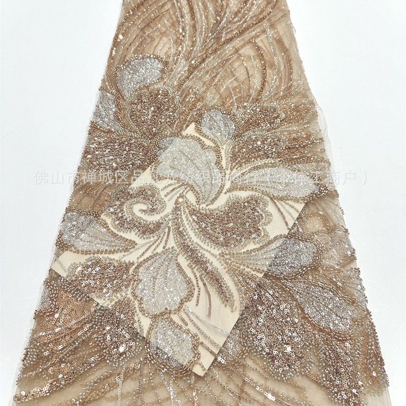 Tejido de encaje bordado de moda europea y americana vestido de cena francés vestido de nicho de diseño de tela