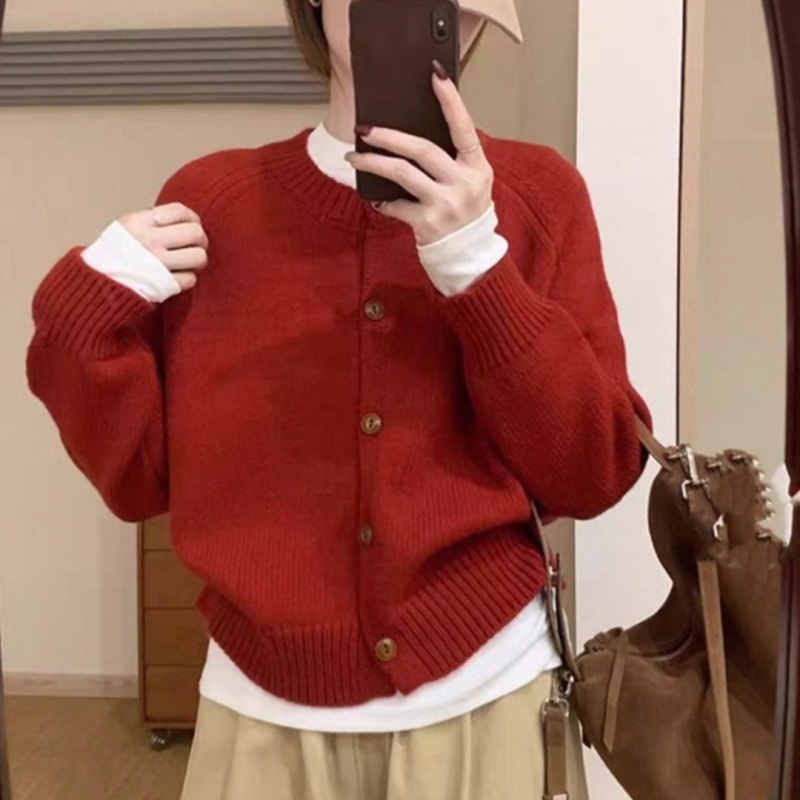Corea del Sur 2025 otoño y invierno nuevo estilo extranjero V-cuello grueso aguja floja de color sólido jersey de punto suéter