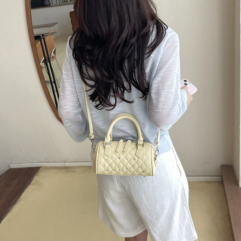 Bolsa cilíndrica coreana para mujeres 2026 nuevo diseño de moda con diamantes bolso portátil sensación cotidiana bolso de Boston