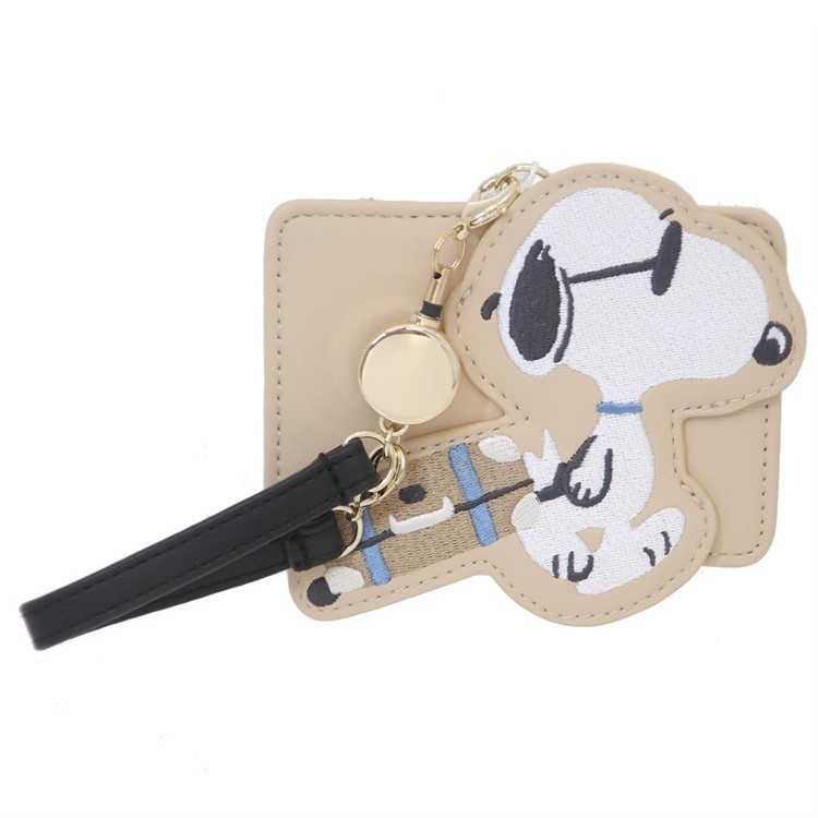 Cuero de imitación japonés Snoopy linda caricatura telescópica cuerda de transporte tarjeta de control de acceso tarjeta de tarjeta de comida portátil para estudiantes