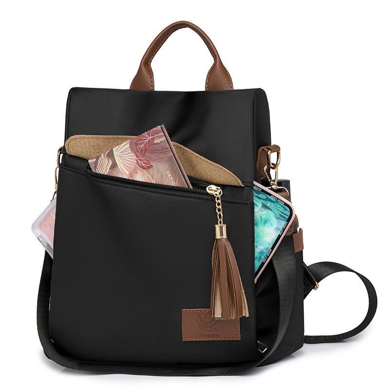 2024 otoño, nueva mochila antirrobo para mujer, borla de moda, color de contraste, nailon, mochila de viaje, mochila escolar, marea