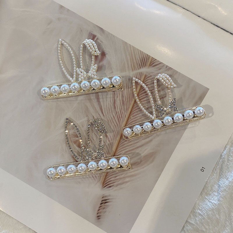 Wholesale Jewelry Imitation Pearl Rhinestone Rabbit Ear Korean Style Hairpin Nihaojewelry display picture 2