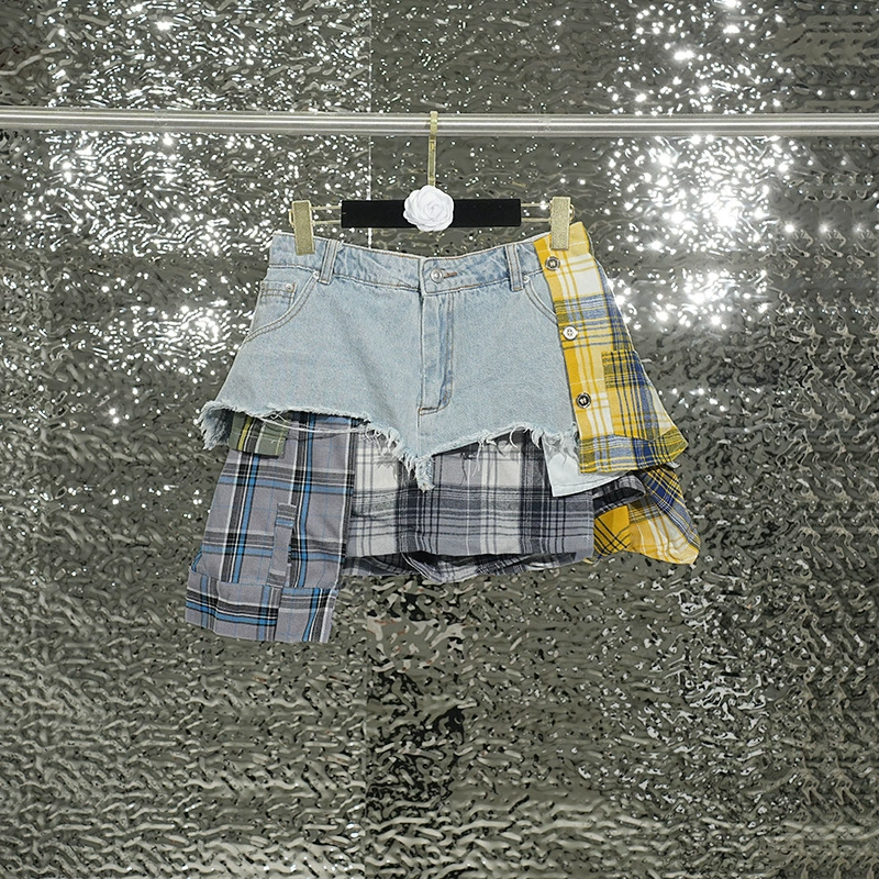 Европейские и американские дизайнеры джинсовая юбка тяжелой промышленности женская летняя новая сетка сшивания, чтобы сблизить нерегулярные юбки-полубу