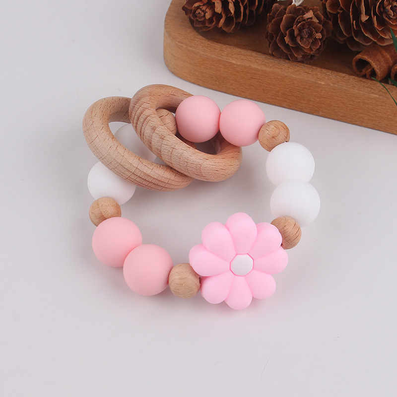 Nuevo juguete de mano para bebé con sonajero, los molares de los niños pueden morder el castaño de haya, margarita, pulsera de flores, mordedor