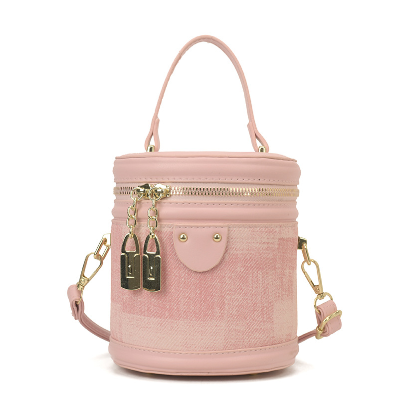Bolsa de cilindro coreana de diseño popular de nicho 2026 nueva moda simple de hombro portátil bolso de cubo